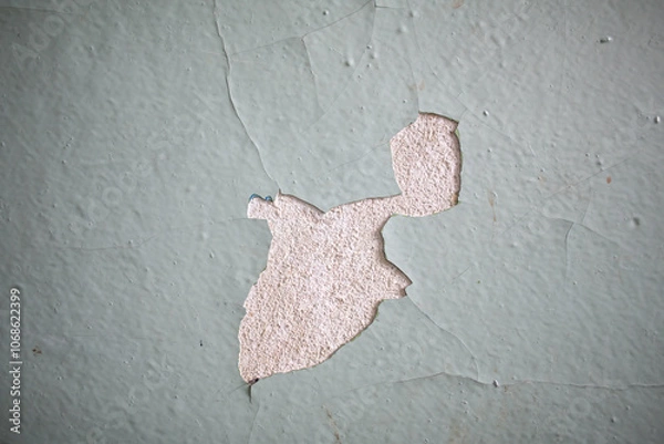 Obraz Cracked, peeling paint on the wall. A wall with old cracked blue paint. Patterns of cracks.