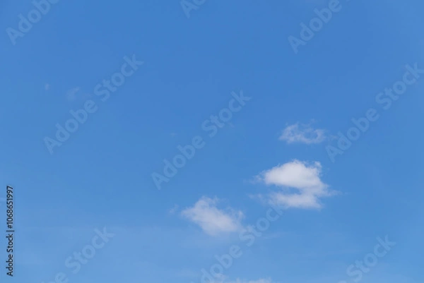 Fototapeta Blue sky background with tiny clouds, Nature cloud blue sky background, Blue Sky with Fluffy White Clouds on a Sunny Summer Day