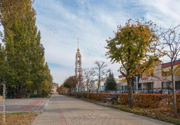Fototapeta View of the bell tower of the Kazan Monastery from Industrialnaya Street in Tambov in autumn