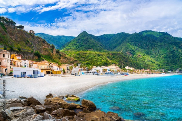Obraz View of the famous beach Spiaggia Di Scilla with crystal clear turquoise water. Beautiful seaside village with old colorful houses in Scilla, Italy.