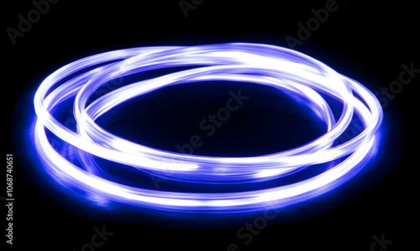 Fototapeta Abstract blue light trails in a circle shape.