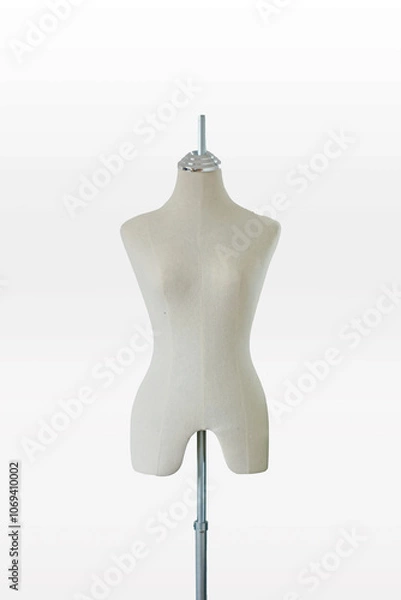 Fototapeta Female mannequin. Tailors dress form mannequin on stand, ideal for fashion design, dressmaking, and sewing projects. White color. Isolated on a white background.