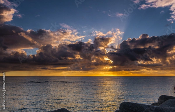 Obraz Colorful cloudy sundown scene in Sunset Beach, Chatan Okinawa, Japan