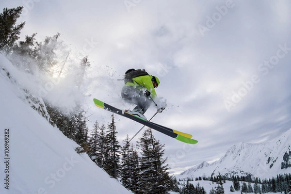 Obraz ski freerider jumping thourgh trees