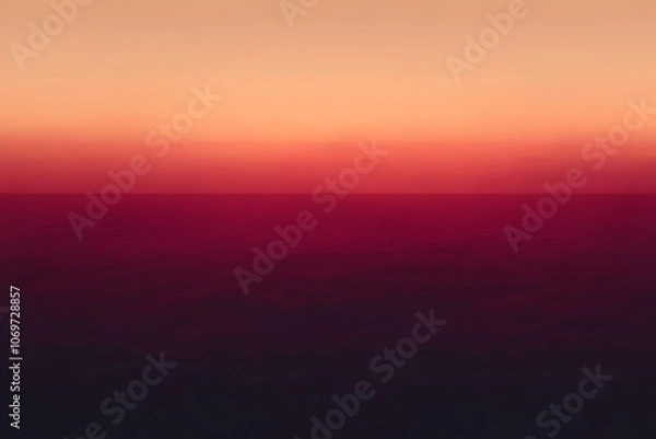 Obraz A stunning gradient sunset over the calm ocean, showcasing hues of orange, pink, and deep red blending into a serene horizon. The tranquil atmosphere evokes peace and reflection.