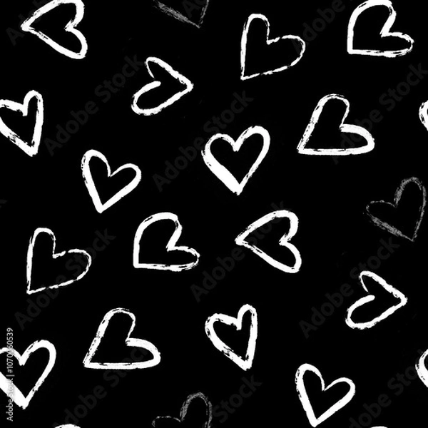 Obraz A seamless  pattern of various hand-drawn white hearts tossed on a black background 