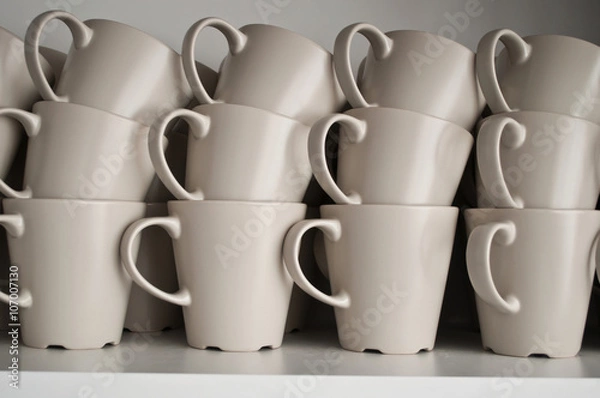 Fototapeta Set of cups in the kitchen