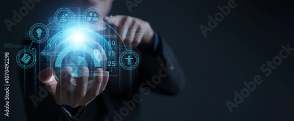 Fototapeta businessman on document planning the business plans and analyse  profitability of working companies with digital augmented virtual graphics for project manager working on laptop and update information