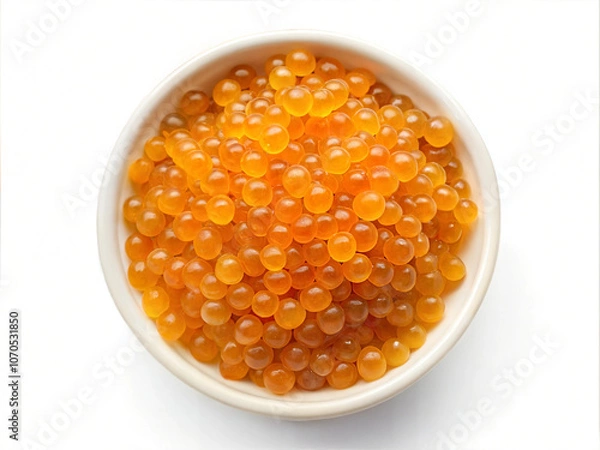 Fototapeta Yellow caviar on white background