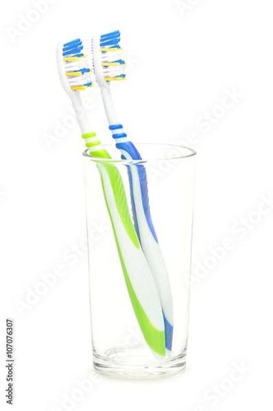 Obraz Зеленая и синяя зубные щетки на изолированном белом фоне