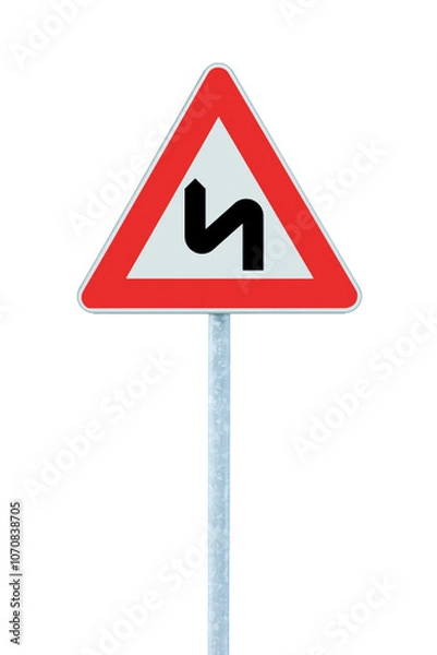 Fototapeta Double bend ahead first to the left road sign, large detailed isolated vertical white triangular dangerous bends warning closeup, red frame, grey metallic pole post, political opportunism bent concept