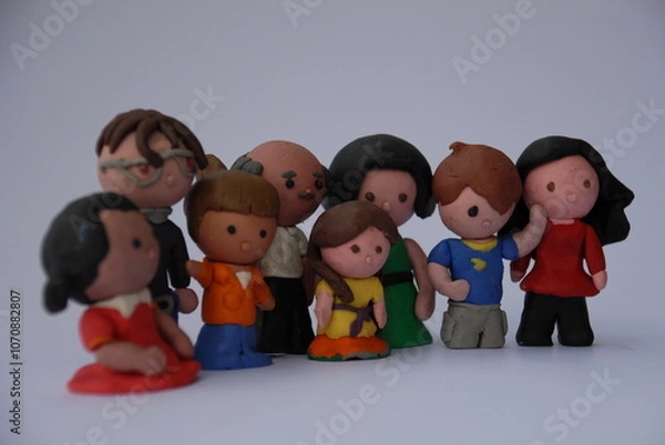 Fototapeta 3D rendering in stylized clay of a group of people of diferent ages and genres. Familiy concept. Diversity concept. Inclusivity concept.