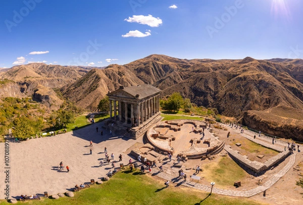 Fototapeta Aerial view of famous Garni pagan temple with Ionic-colonnaded. Historic Greek style building is located on gorge. Built in I century AD by Armenian king Trdat. Ancient Khosrov Reserve, Armenia Europe