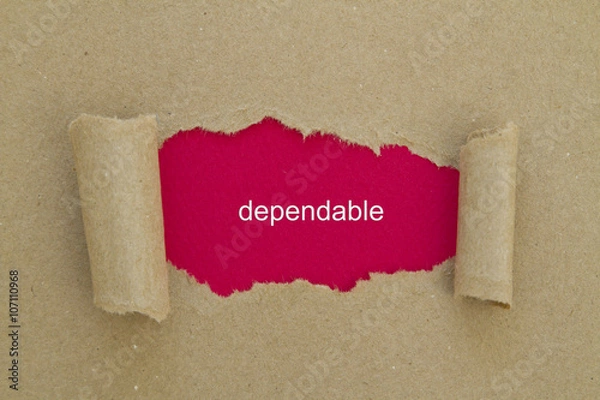 Obraz Dependable word written under torn paper.