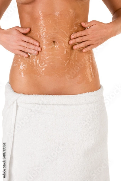 Obraz Exfoliation Woman Putting scrub on abdomen area of torso