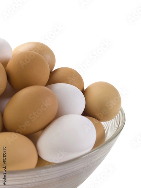 Fototapeta close up image of white and brown eggs