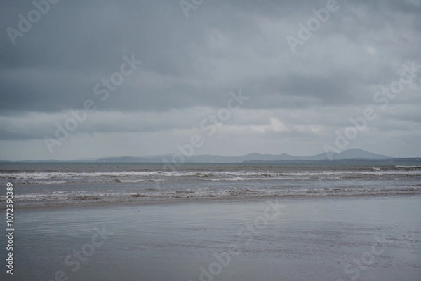 Obraz Cloudy day panorama at the beach low tide