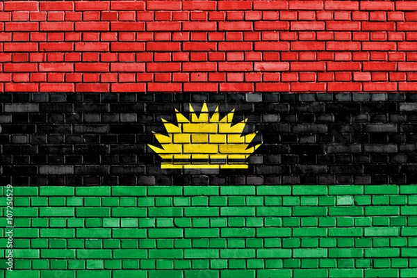Obraz flag of Biafra painted on brick wall