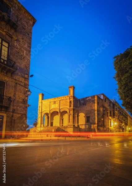 Fototapeta June 2023, Palermo, Sicily, Italy: Street scene at the evening with light tracks. Long exposure.