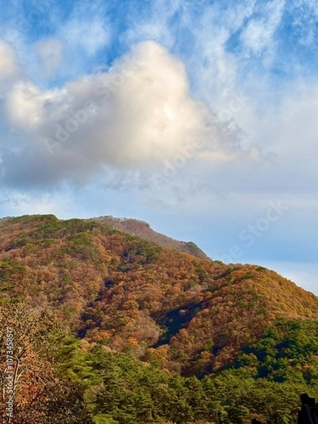 Obraz Autumn mountain and huge clouds