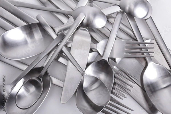 Fototapeta Cutlery set with Fork, Knife and Spoon on white background