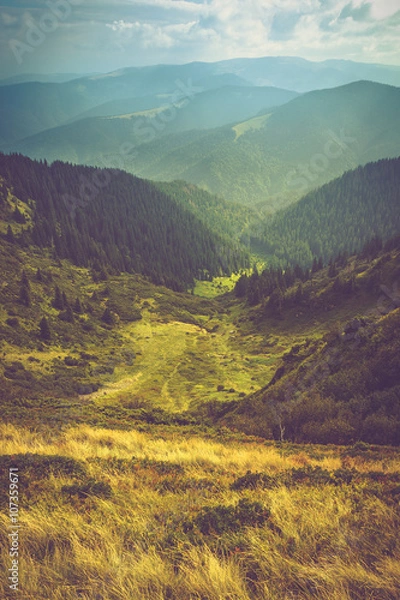 Fototapeta Scenic view of mountains, summer landscape with colorful hills