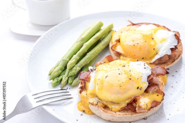 Obraz eggs benedict,on the white dish,isolated background