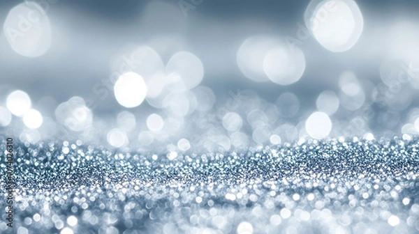 Fototapeta Abstract blue bokeh background with defocused glitter closeup of sparkling metallic pigment dust