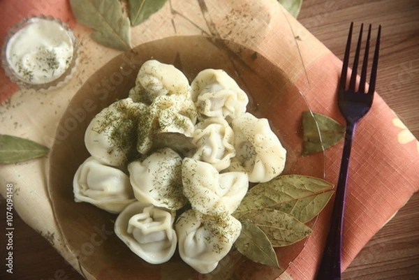 Fototapeta dumplings with meat on the table