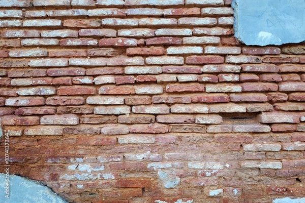 Fototapeta Weathered Brick Wall with Rustic Texture