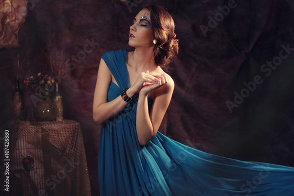 Fototapeta young woman in blue dress