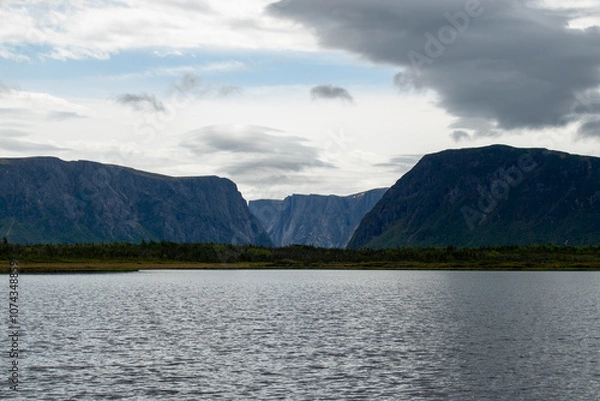 Fototapeta Aboard the ferry on Western Brook Pond, the breathtaking fjord and surrounding landscapes unfold, offering a tranquil and scenic journey through Gros Morne National Park.