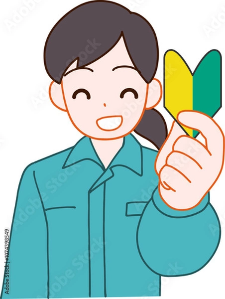 Obraz 作業服を着た初心者マークを持つ笑顔のデフォルメ女性のイラスト