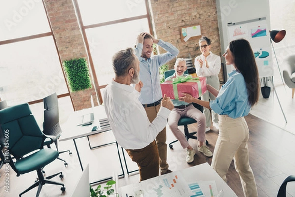 Fototapeta Photo of coworking project teamwork people congratulate birthday gift work together conference meeting successful nice light office