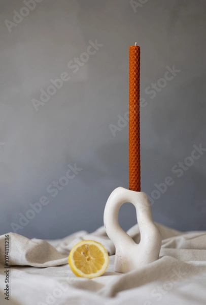 Obraz Handmade beeswax candle, interior design with authentic decor