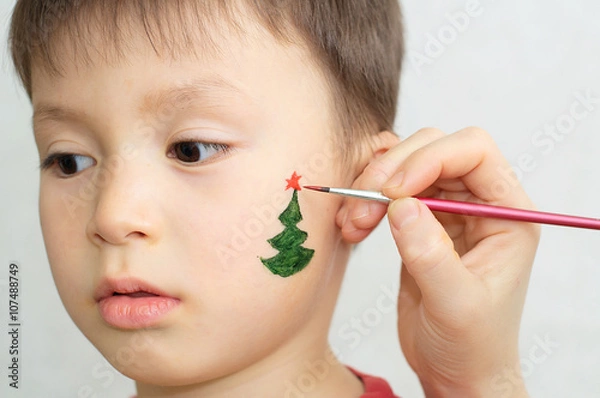 Obraz Boy face painting for christmas party