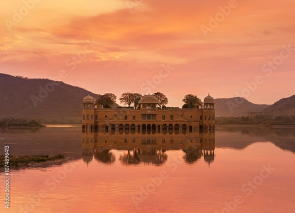 Obraz Jal Mahal or Water Palace in Rajput and Mughal of styles architecture in Man Sagar lake on sunrise in Jaipur city ,Rajasthan, India.