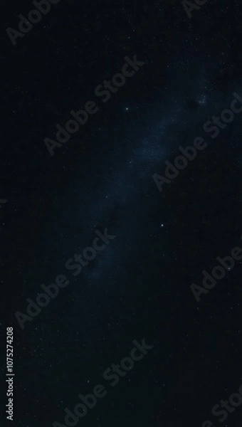 Fototapeta A Breathtaking View of the Night Sky Filled With Stars and Cosmic Wonders From a Remote Location