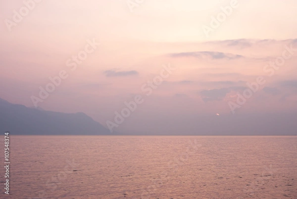 Fototapeta Pink sunset over lake