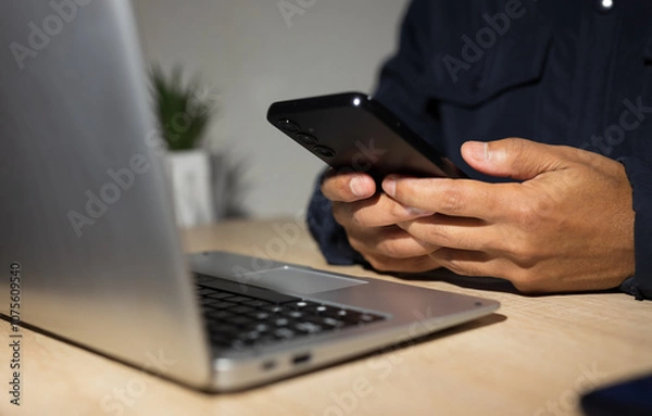 Obraz customer who uses the laptop and telephone to give a satisfaction rating, business reputation rating, quality of service.