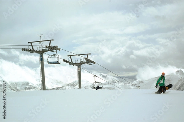 Obraz Ski. Lift in the snowing High Mountains. Clouds. Wide landscape
