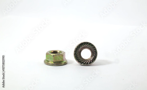 Fototapeta Front view of 2 adjacent flange nuts on a white background. Part for mechanical or woodworking.