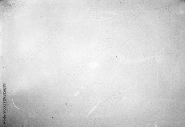 Fototapeta Abstract dirty or aging film. Dust particle and grain texture or dirt use for overlay film frame effect. Dust scratches effect for vintage film grunge textured effect design.