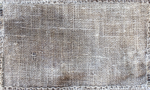 Obraz Old coarse sacking close-up for use as background with natural frame