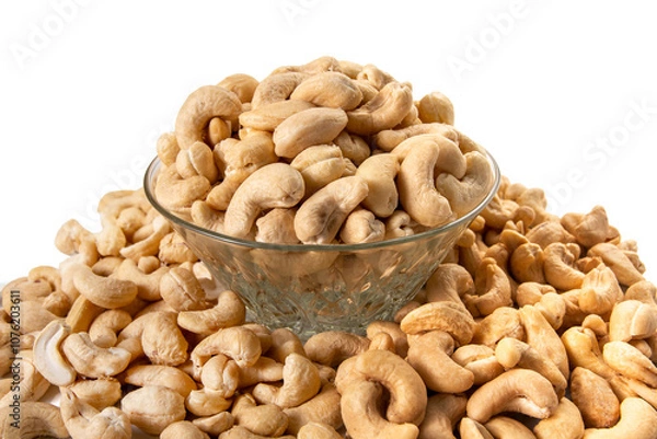 Fototapeta cashew nuts in glass bowl on white background