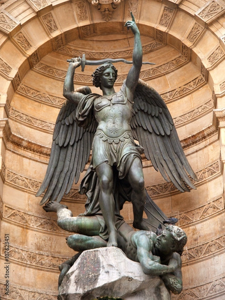 Obraz The statue of Saint Michael atop the fountain in the Place Saint-Michel at the northern end of the Boulevard Saint-Michel. Close up shot