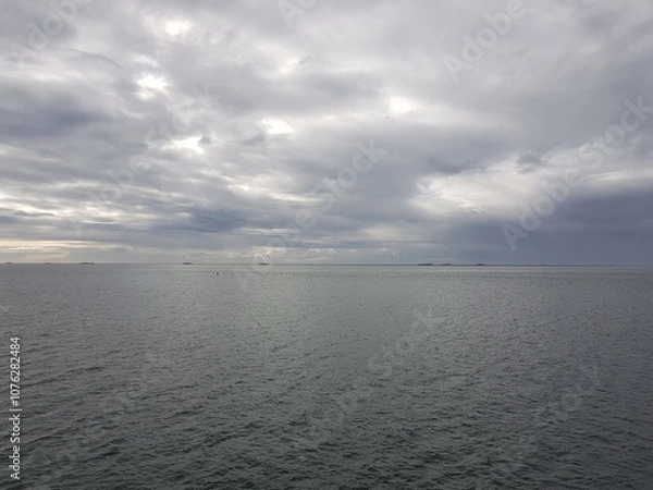 Fototapeta clouds over the sea