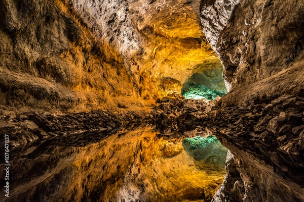 Obraz Optical illusion - water reflection in Cueva de los Verdes, an amazing lava tube and tourist attraction on Lanzarote island, Spain