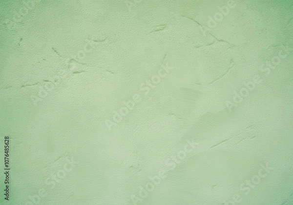Fototapeta Textured green wall with subtle patterns and soft color tones