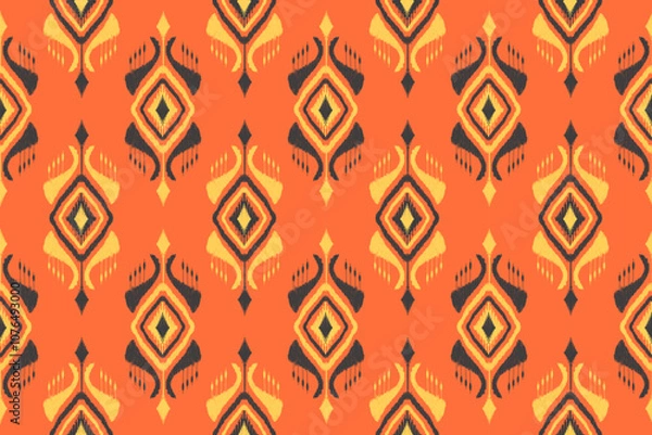 Obraz Ethnic Ikat seamless pattern on a orange background. Hand drawn tribal style beautiful fabric pattern. for carpet, textile, rug, clothing, batik, motif.
